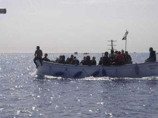 Holzboote vom Tauchzentrum Ile d'Or 